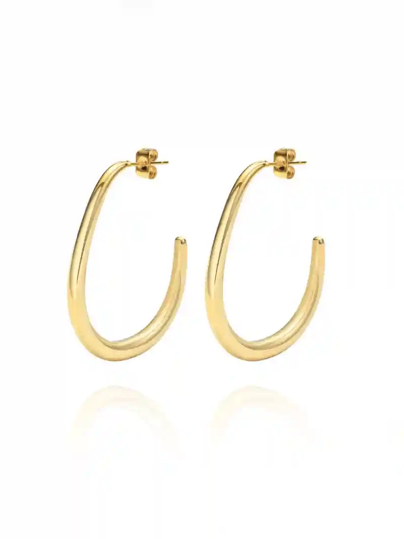 Elevate your style with the Anna Earrings, where sophistication meets modern design. These stunning earrings are expertly crafted from robust stainless steel and embellished with a luxurious 18k gold plating, offering a brilliant shine that’s sure to turn heads.