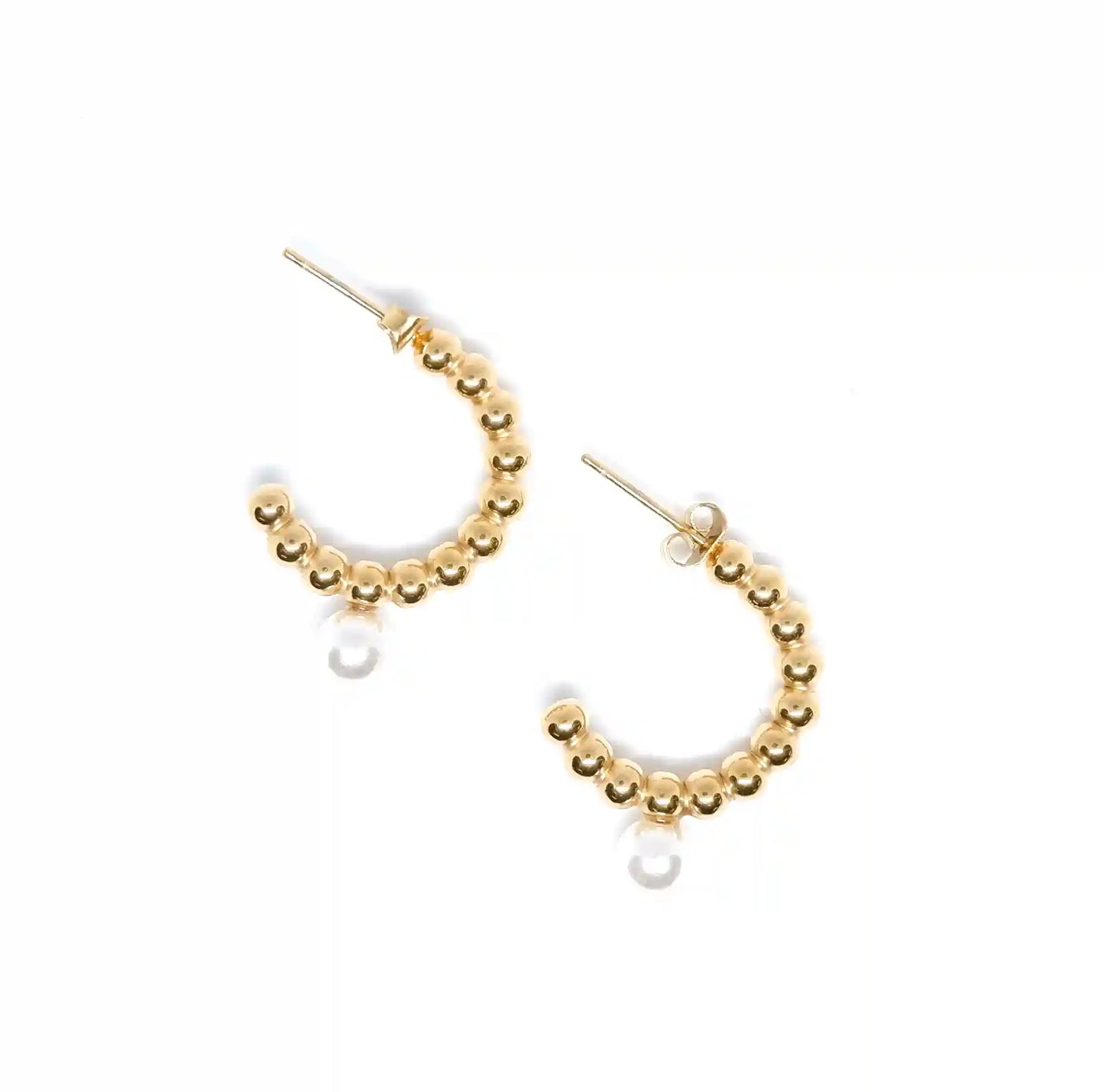 Elevate your jewellery collection with the exquisite Bobble Pearl Hoop Earrings. Each earring is a masterpiece, boasting an array of gleaming spheres with a luxurious 18K gold plating over sturdy stainless steel. The design is completed with a lustrous pearl, adding a touch of sophistication to this elegant accessory.