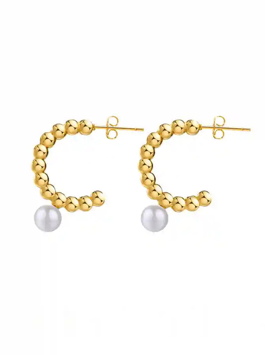 Elevate your jewellery collection with the exquisite Bobble Pearl Hoop Earrings. Each earring is a masterpiece, boasting an array of gleaming spheres with a luxurious 18K gold plating over sturdy stainless steel. The design is completed with a lustrous pearl, adding a touch of sophistication to this elegant accessory.