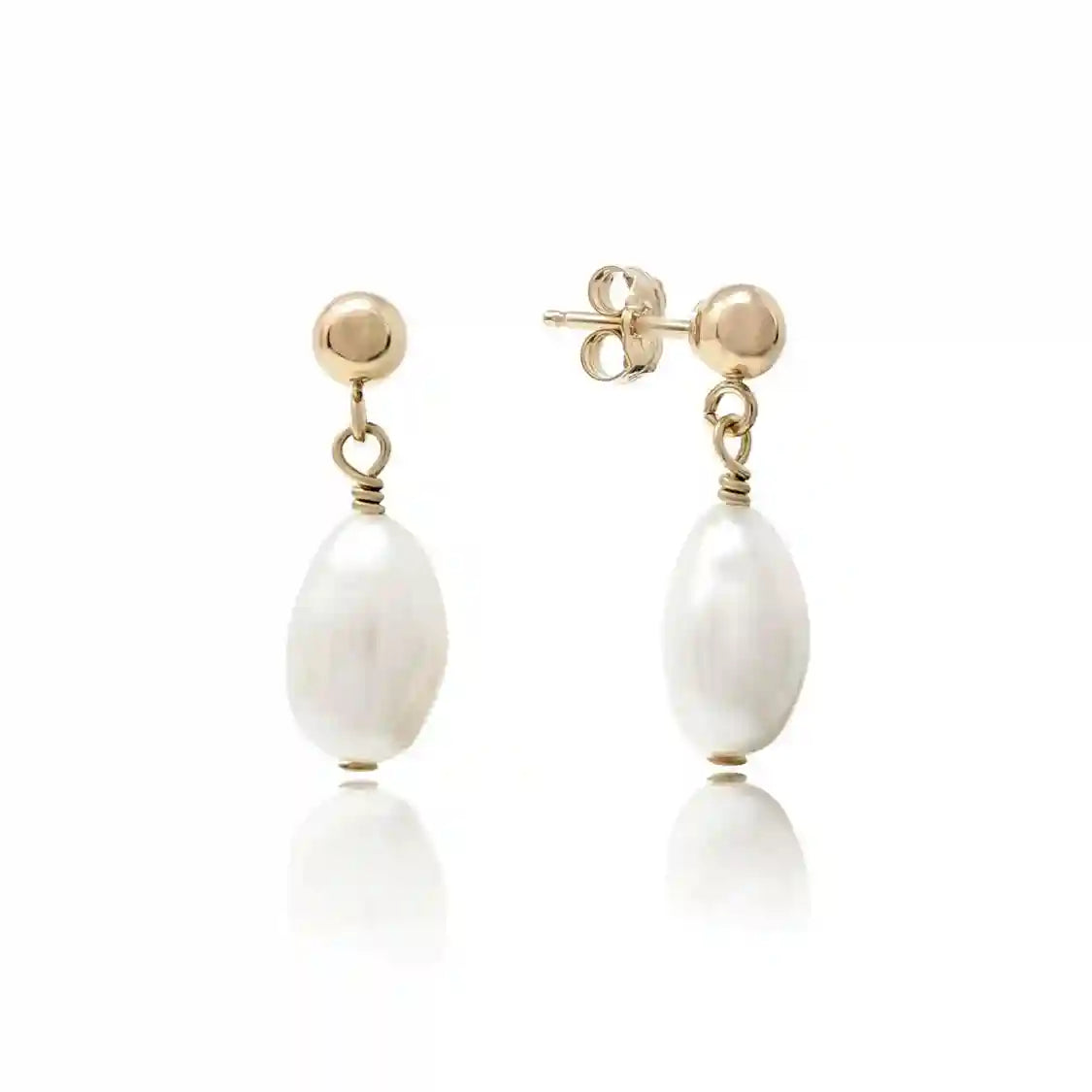 Introducing the Camile Pearl Hoops Earrings, where minimalism meets elegance. Crafted with a delicate golden circle, each earring is plated with 18K gold over 925 Sterling Silver, providing a perfect blend of strength and beauty. Dangling gracefully from each hoop is a pearl pendant, its unique shape lending an air of individuality to the piece.