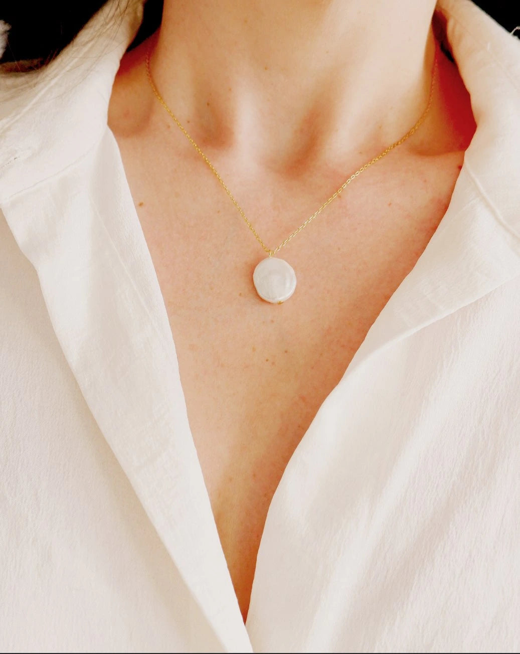 Our Keshi Flat Pearl Necklace is a timeless and elegant piece designed to enhance the natural beauty of the wearer. This exquisite necklace seamlessly blends sophistication with simplicity, making it the perfect gift for any occasion, whether it's a Valentine's, birthday, anniversary, graduation, or a meaningful milestone.