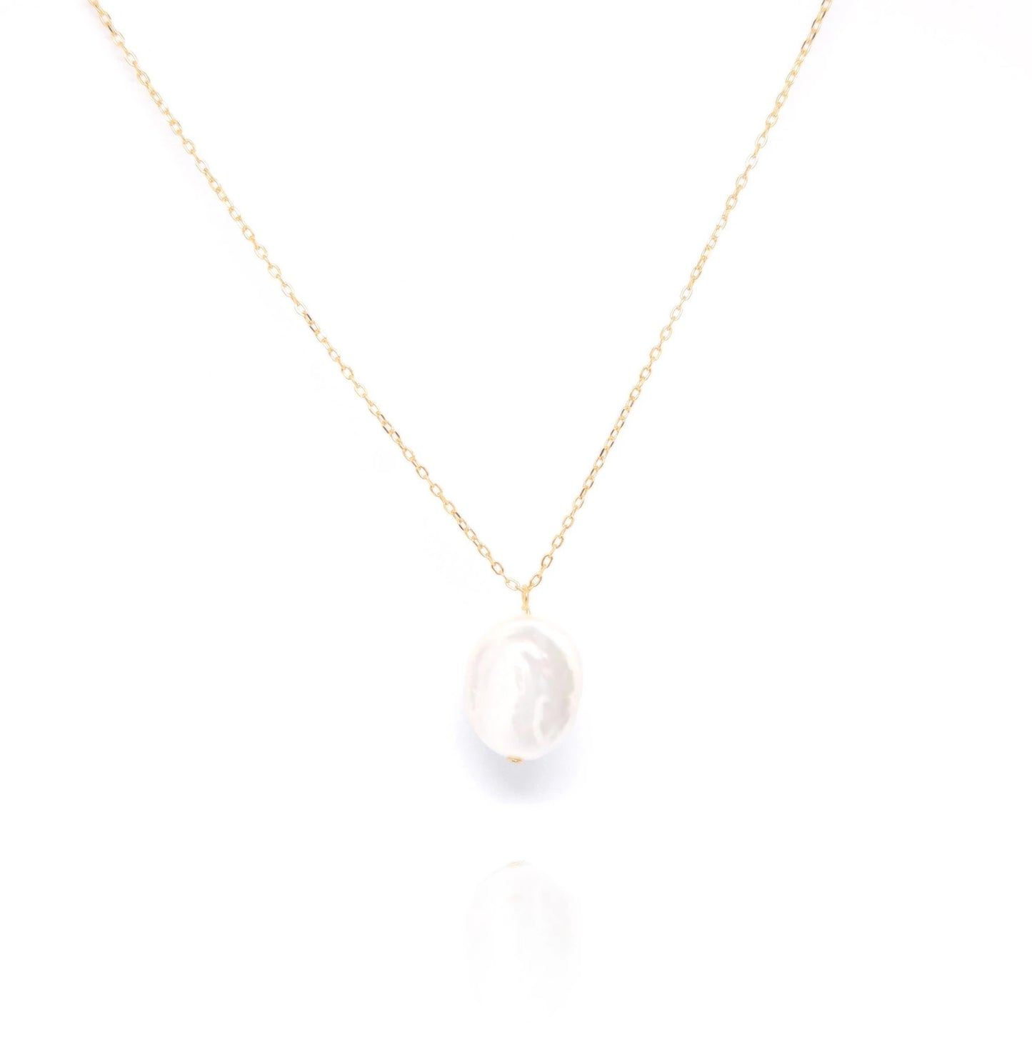 Our Keshi Flat Pearl Necklace is a timeless and elegant piece designed to enhance the natural beauty of the wearer. This exquisite necklace seamlessly blends sophistication with simplicity, making it the perfect gift for any occasion, whether it's a Valentine's, birthday, anniversary, graduation, or a meaningful milestone.